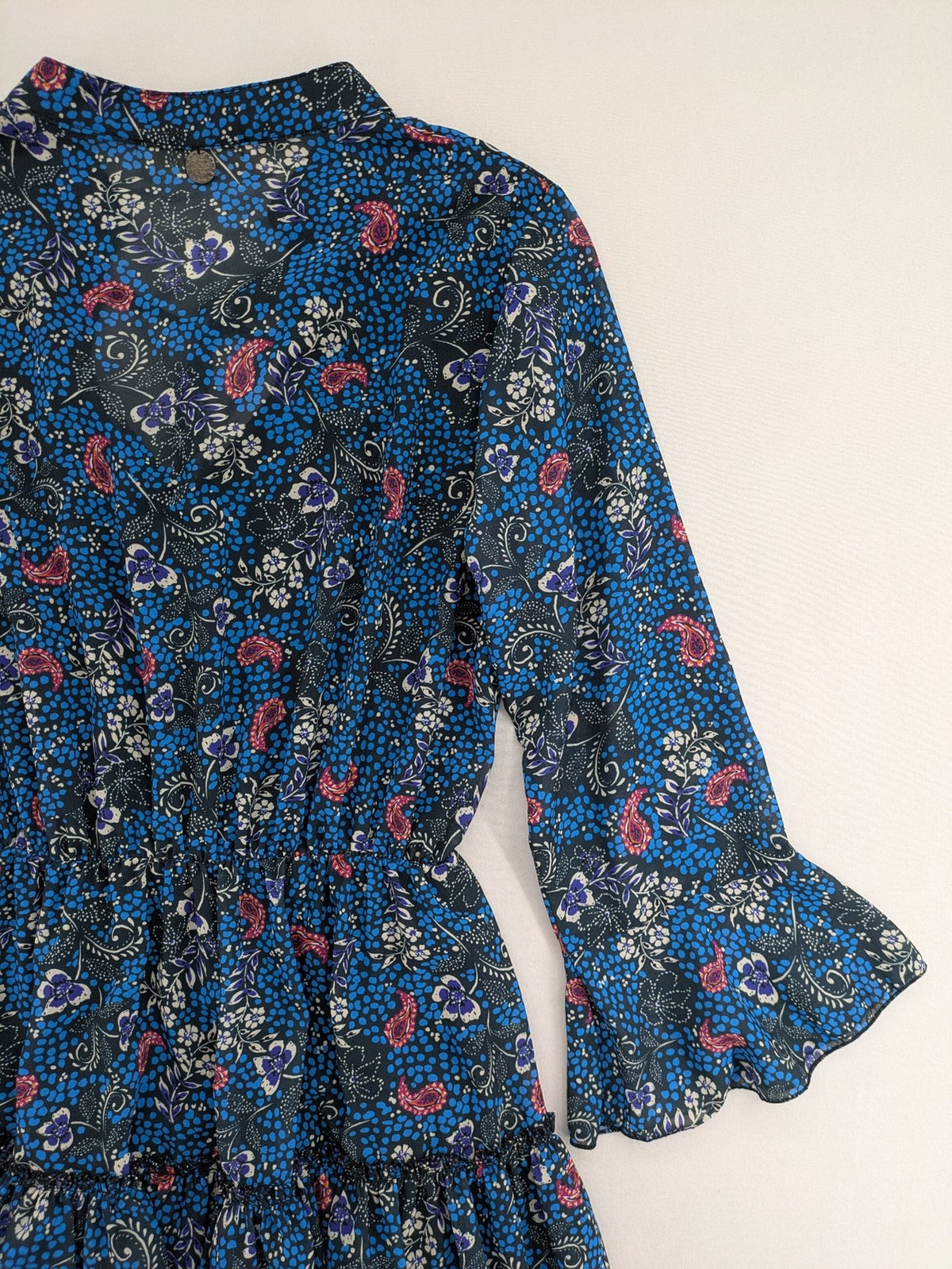 BSB multi-coloured bridal party dress with floral paisley pattern and ruffled hem.