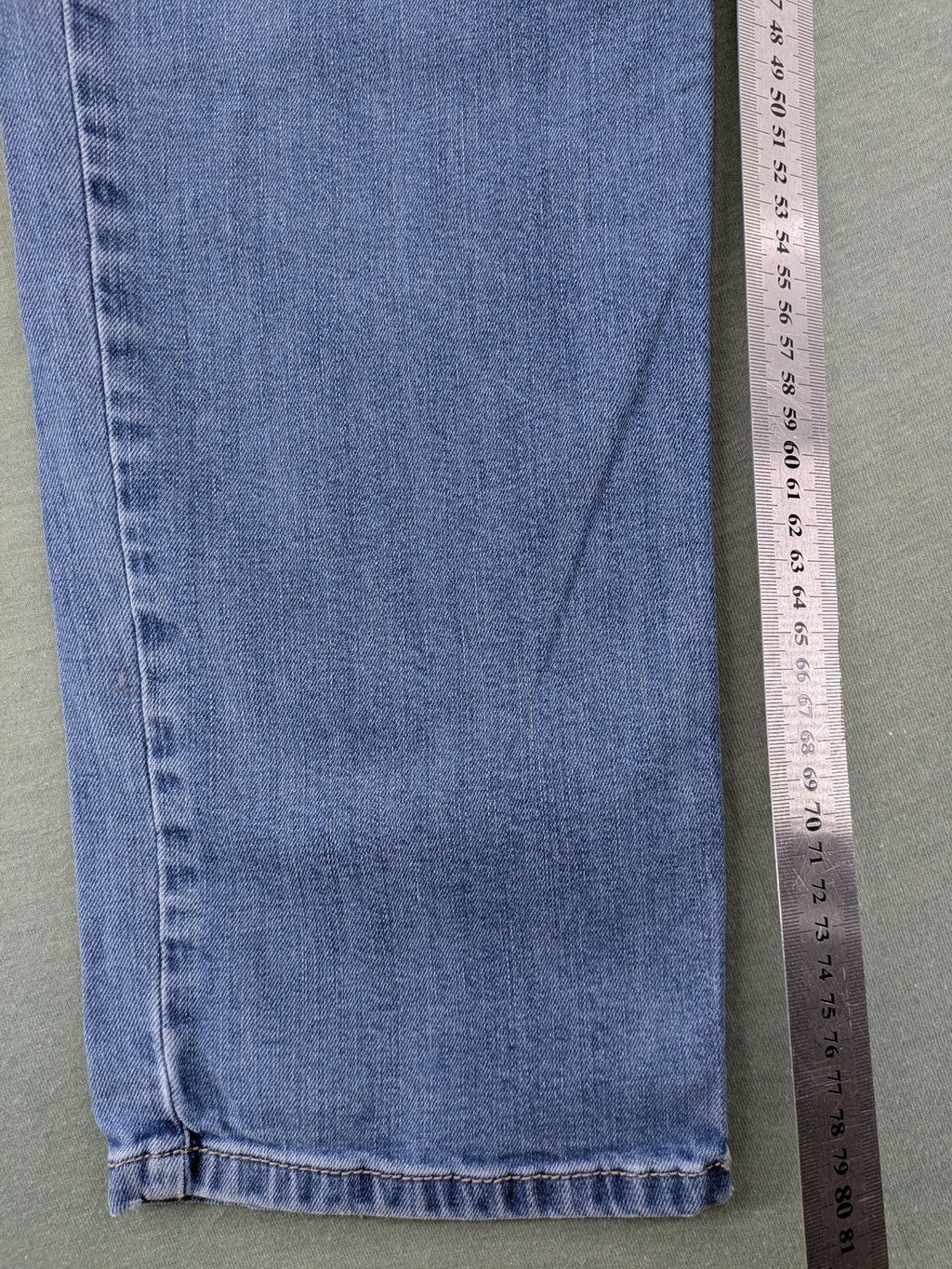 Bugatti blue straight jeans with classic 5-pocket design and light wash denim.