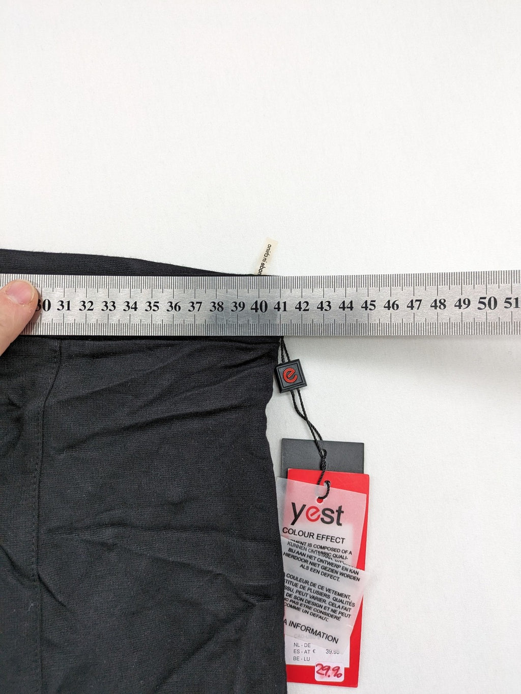 Yest black long skirt with grey faux leather panel and stretchy fabric.