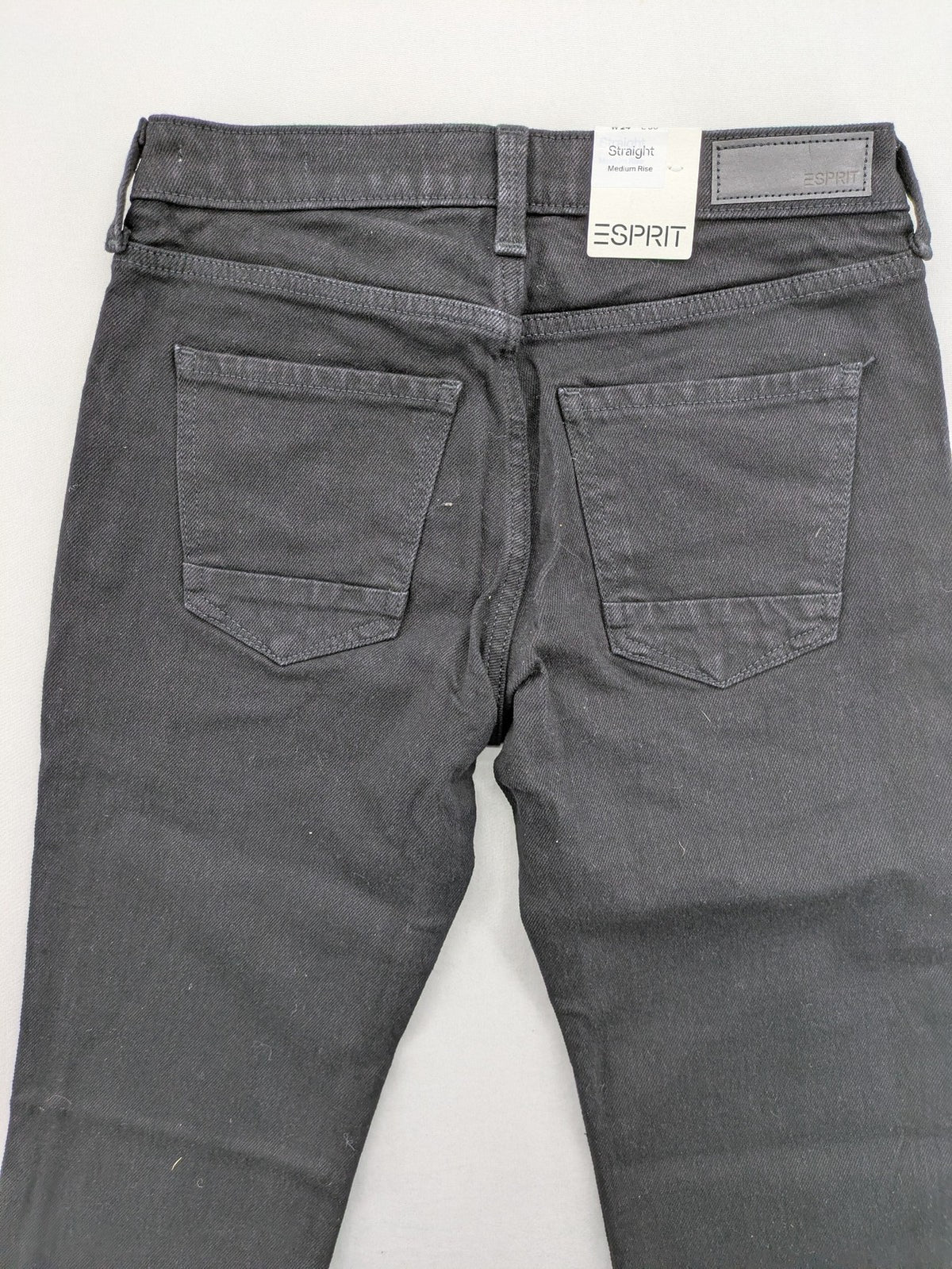 Esprit grey straight jeans with medium rise and original tags, classic denim style.