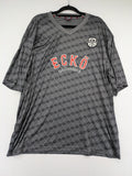 Ecko Unltd. grey soccer uniform V-neck with all-over logo print and embroidered FC patch.