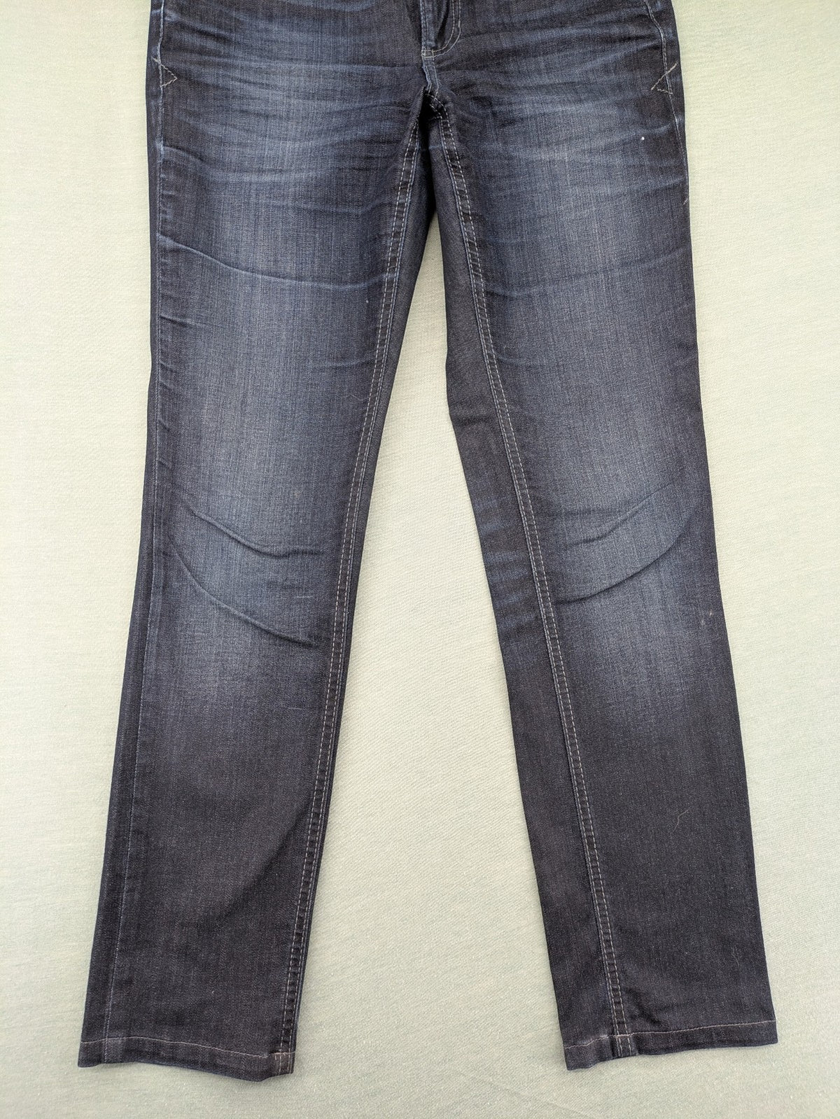 Mac Jeans blue straight jeans dark wash with subtle fading and stretch denim material.