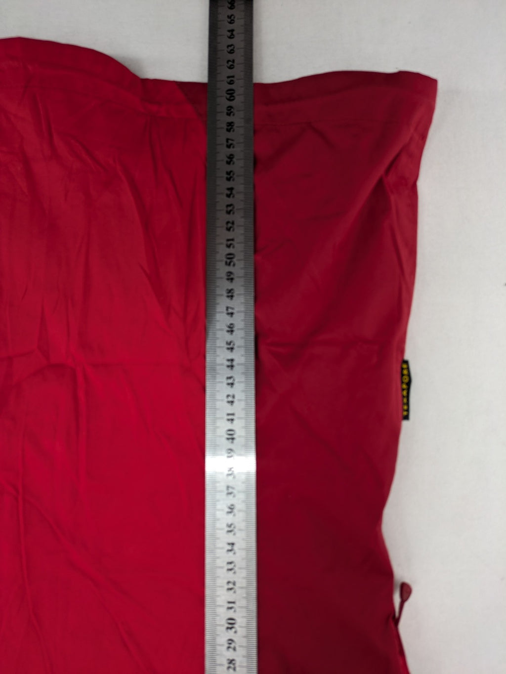 Jack Wolfskin red outdoor jacket with adjustable hood and Texapore waterproof technology