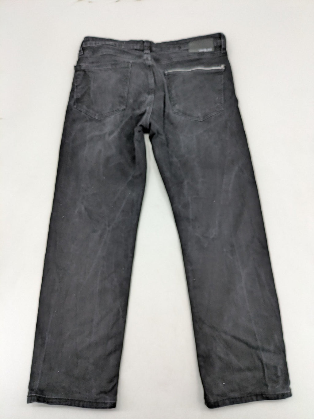 Mavi straight jeans black washed denim with subtle stretch and classic design.