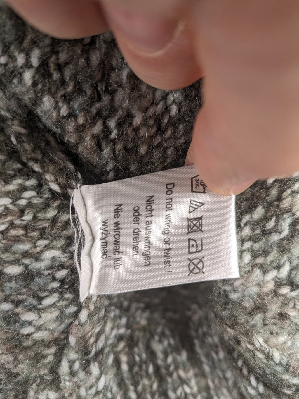 Kenar turtle neck jumper black grey white melange wool blend open knit design