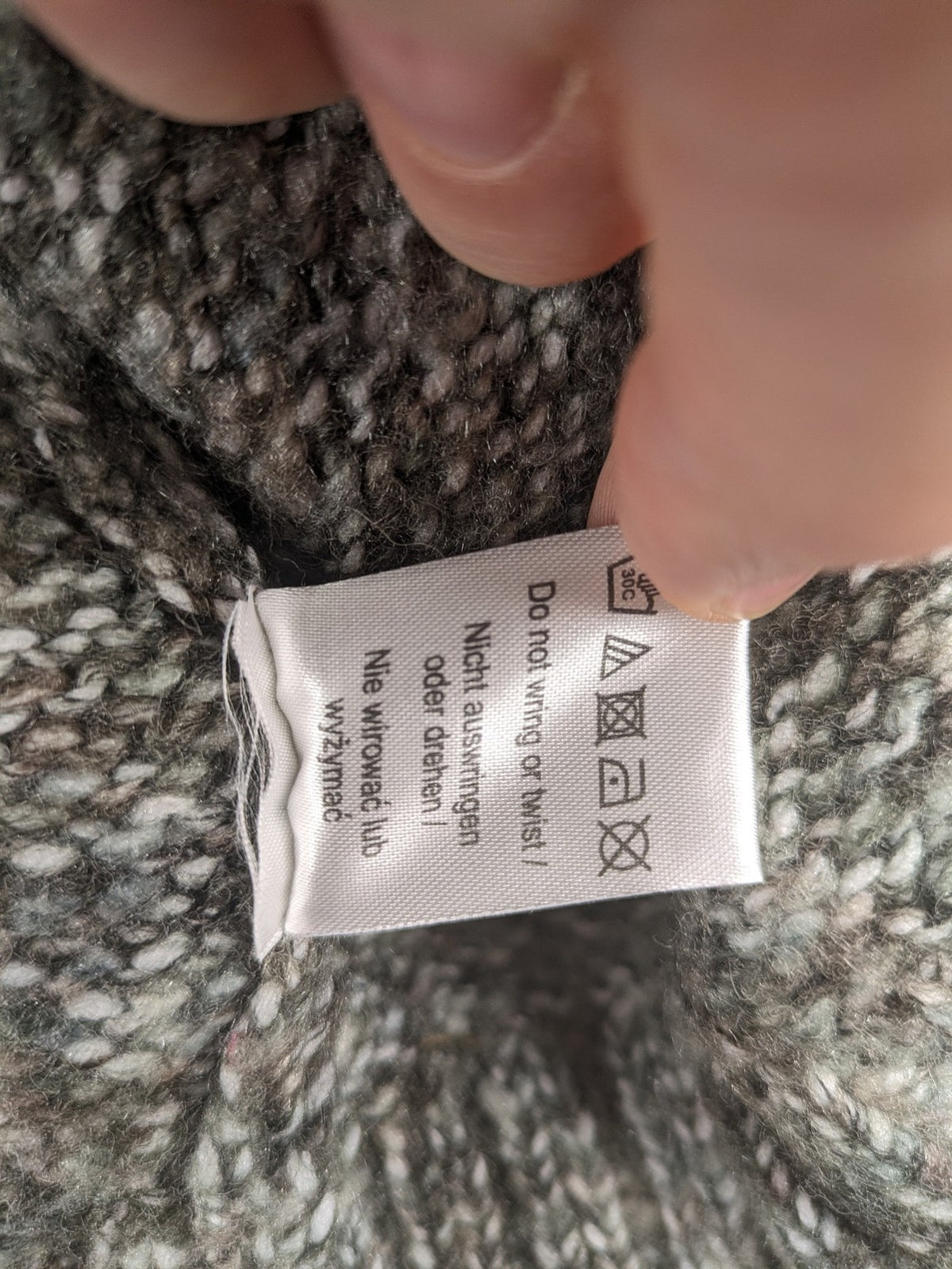 Kenar turtle neck jumper black grey white melange wool blend open knit design