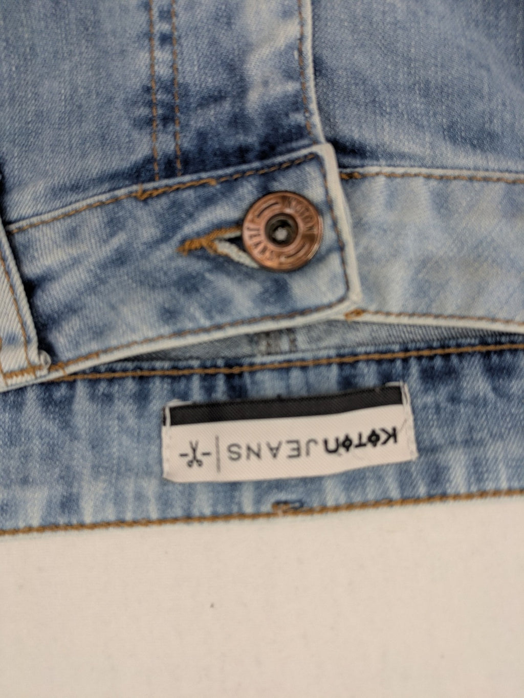 Koton Jeans blue straight jeans with distressed details and classic 5-pocket style.