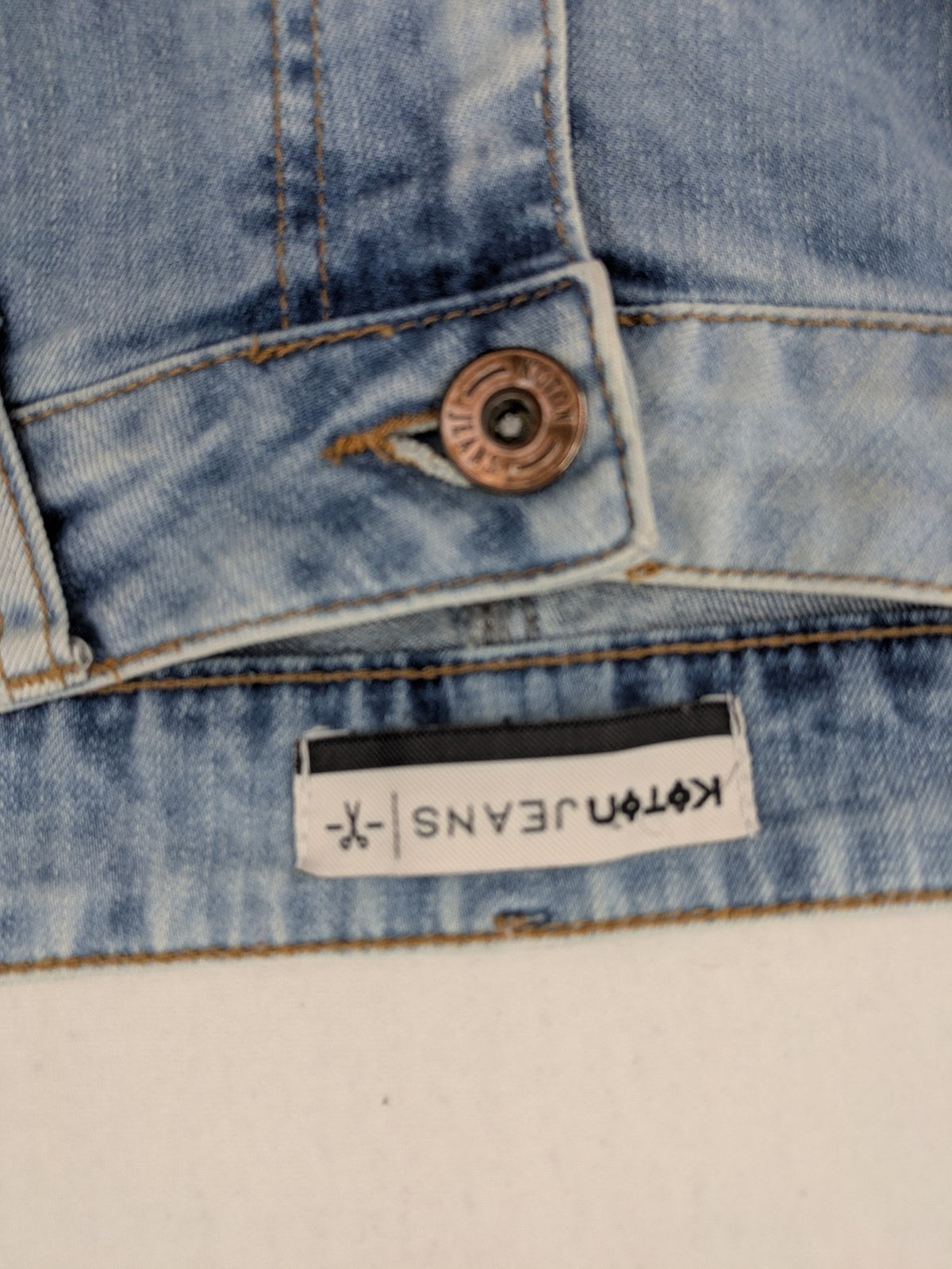 Koton Jeans blue straight jeans with distressed details and classic 5-pocket style.