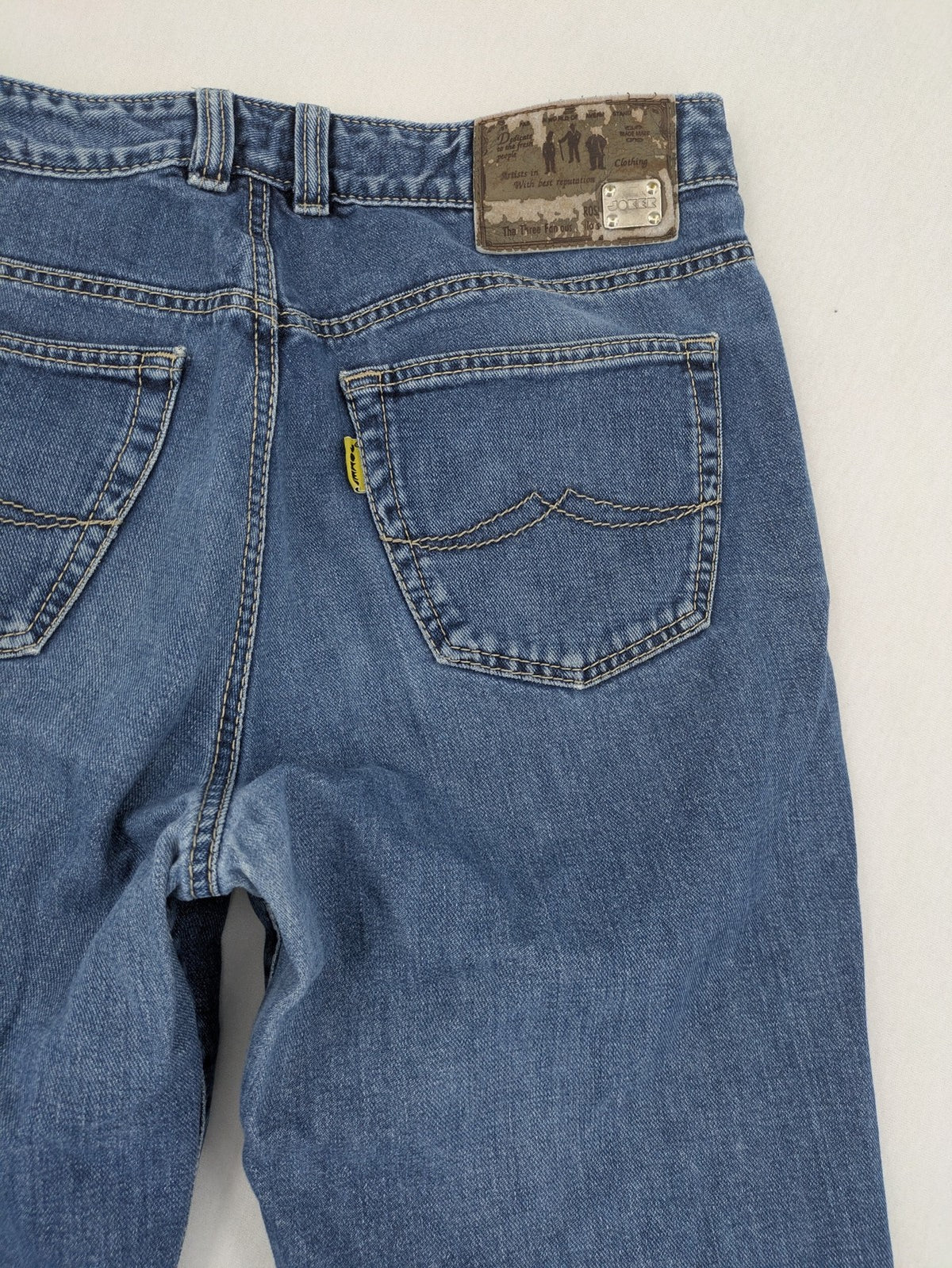 Joker blue straight leg jeans with double saddle stitched detail and classic denim wash.