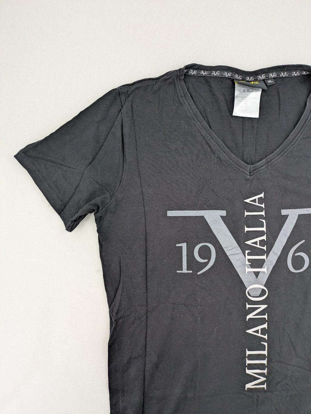 Versace 19.69 black short sleeve t-shirt with graphic logo print and V-neck design.