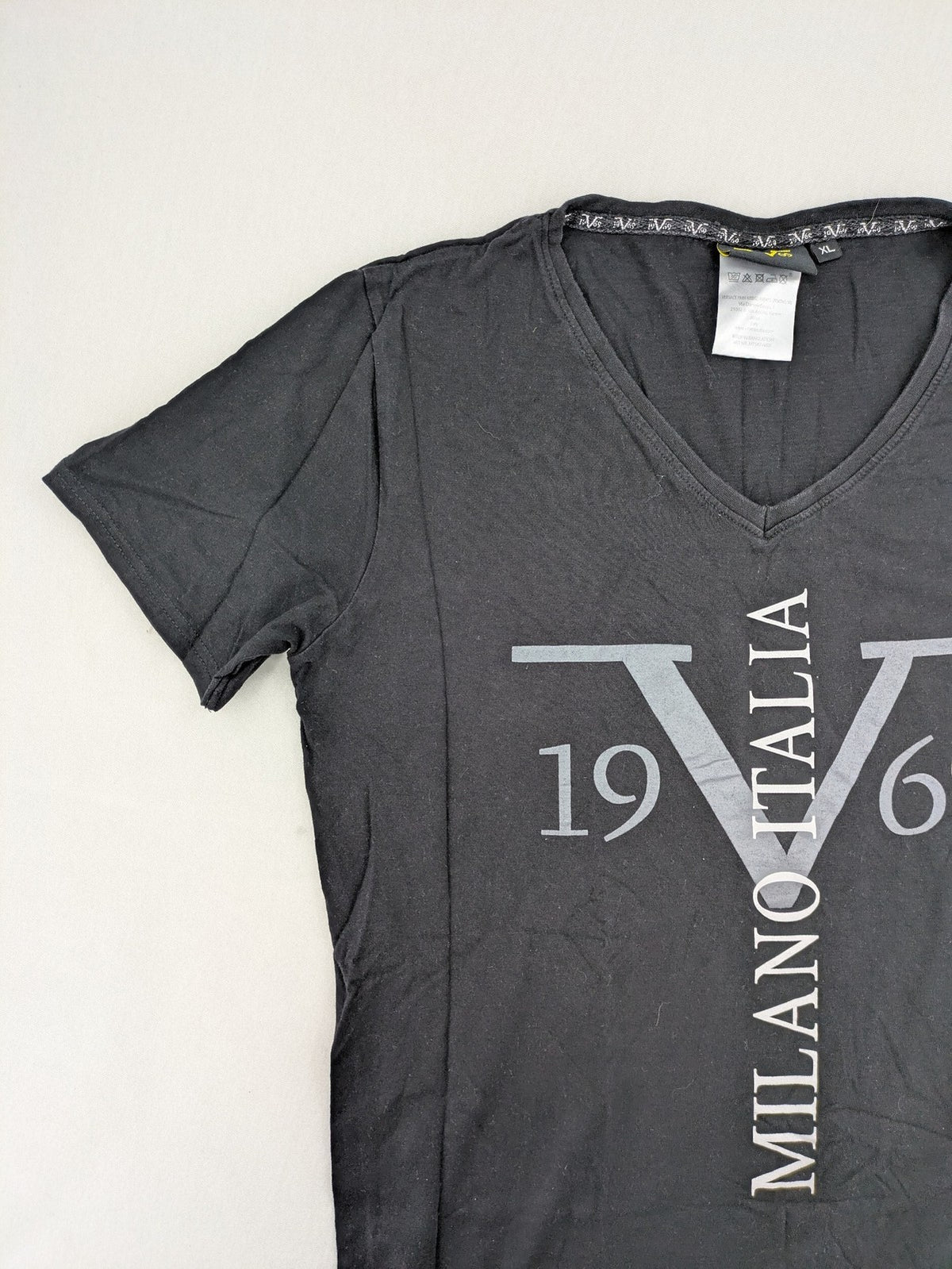 Versace 19.69 black short sleeve t-shirt with graphic logo print and V-neck design.
