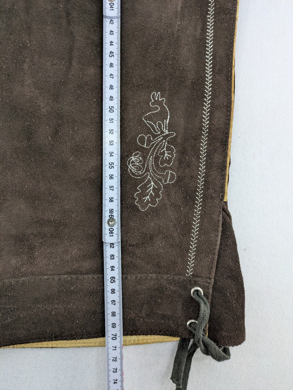 Braun traditional leather pants brown suede with intricate embroidery on bib and legs.