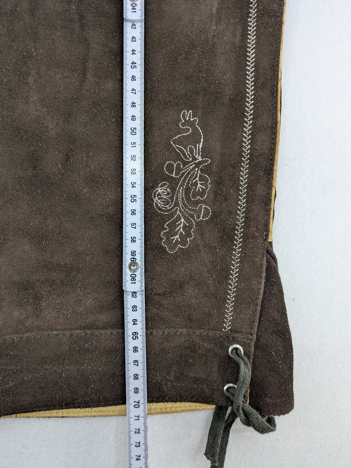 Braun traditional leather pants brown suede with intricate embroidery on bib and legs.