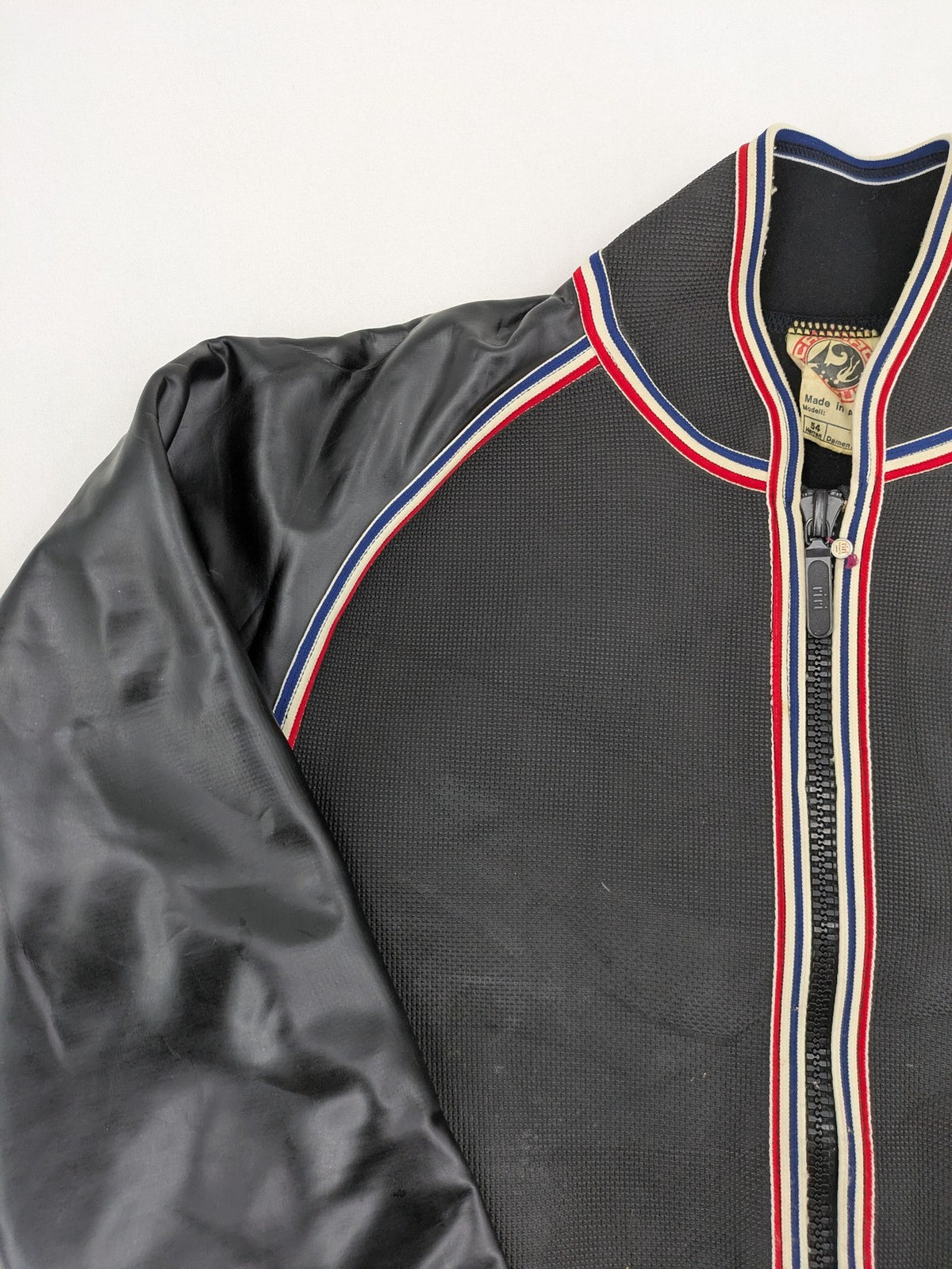 Camaro vintage jacket multi-colour with striped accents and structured body.