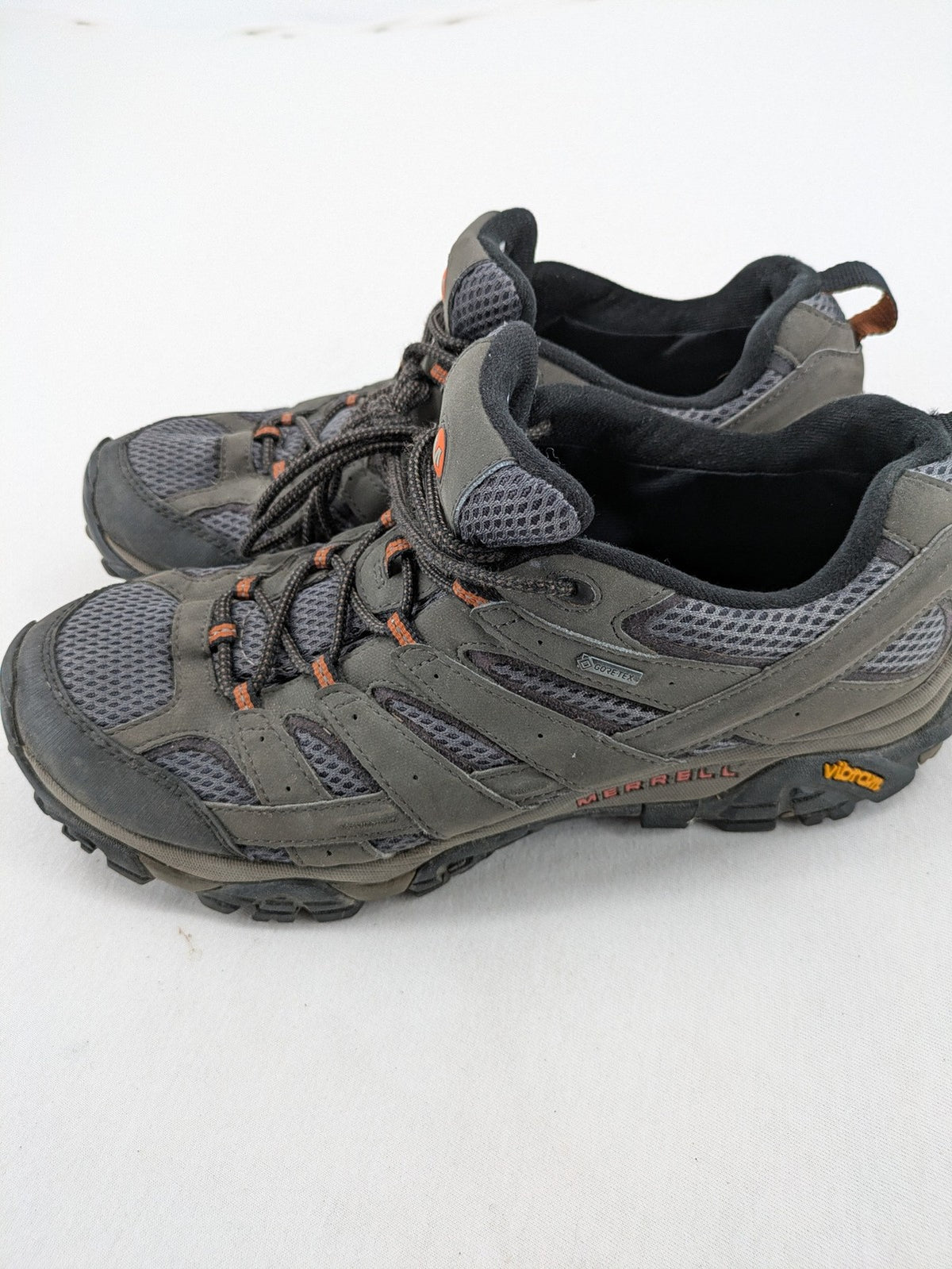 Merrell grey hiking shoes with Gore-Tex membrane and Vibram sole for traction.