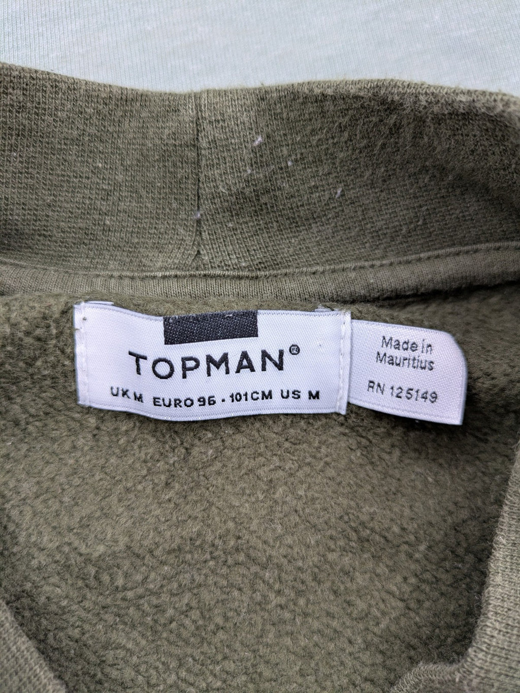Topman green turtle neck jumper with white colorblock and yellow piping, embroidered logo.