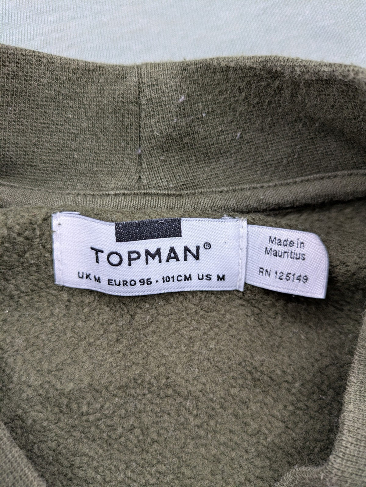 Topman green turtle neck jumper with white colorblock and yellow piping, embroidered logo.