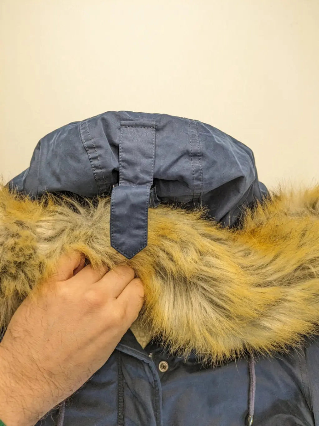 Tommy Hilfiger Denim blue parka coat with faux fur hood and Sherpa lining.