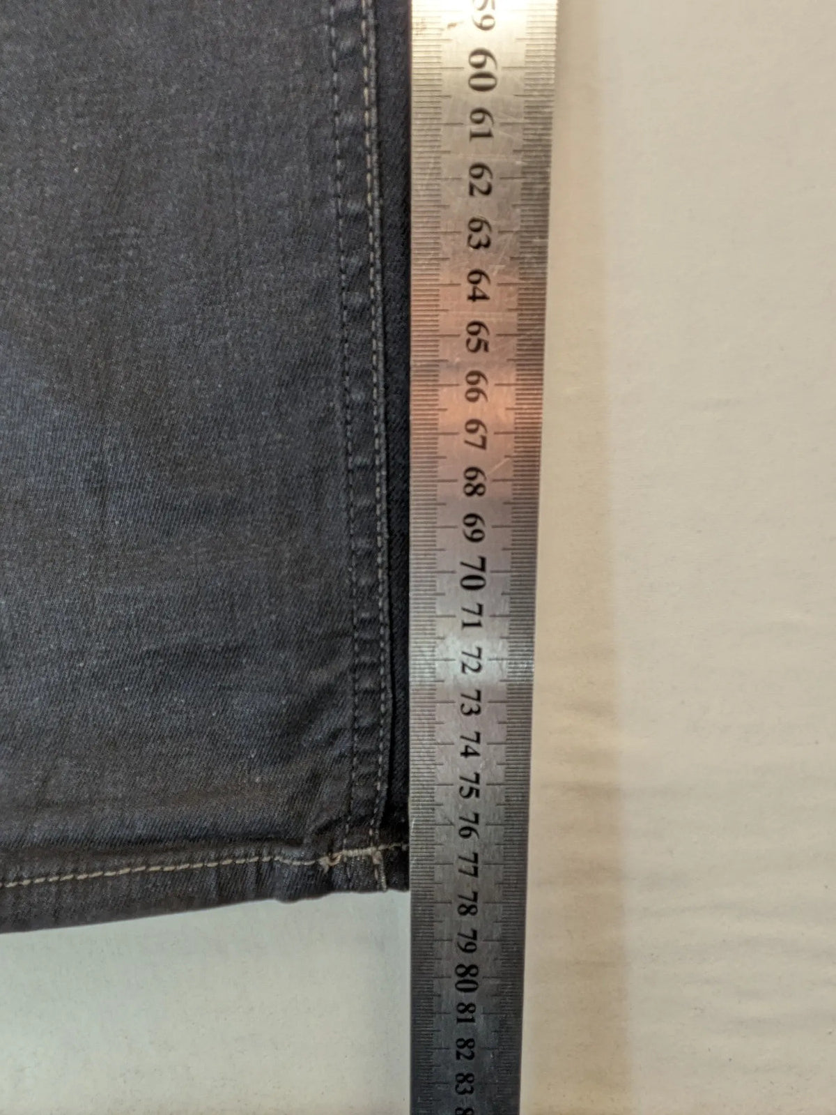 Jack & Jones grey slim fit jeans with classic 5-pocket style and button closure.