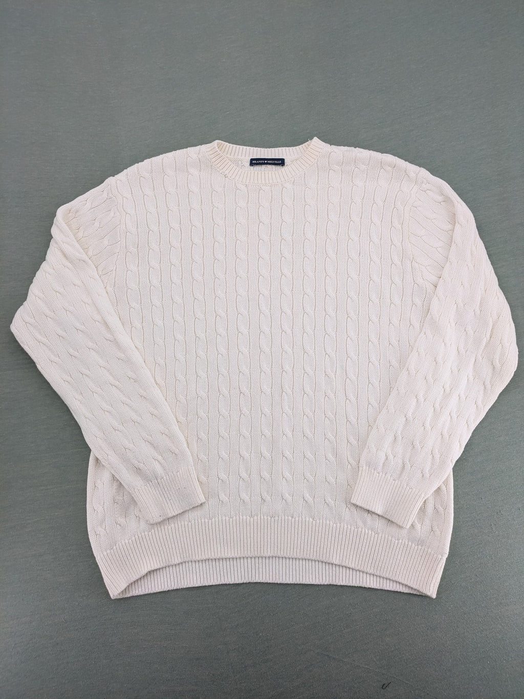 Brandy Melville cream turtle neck jumper with allover cable knit pattern and ribbed hem.