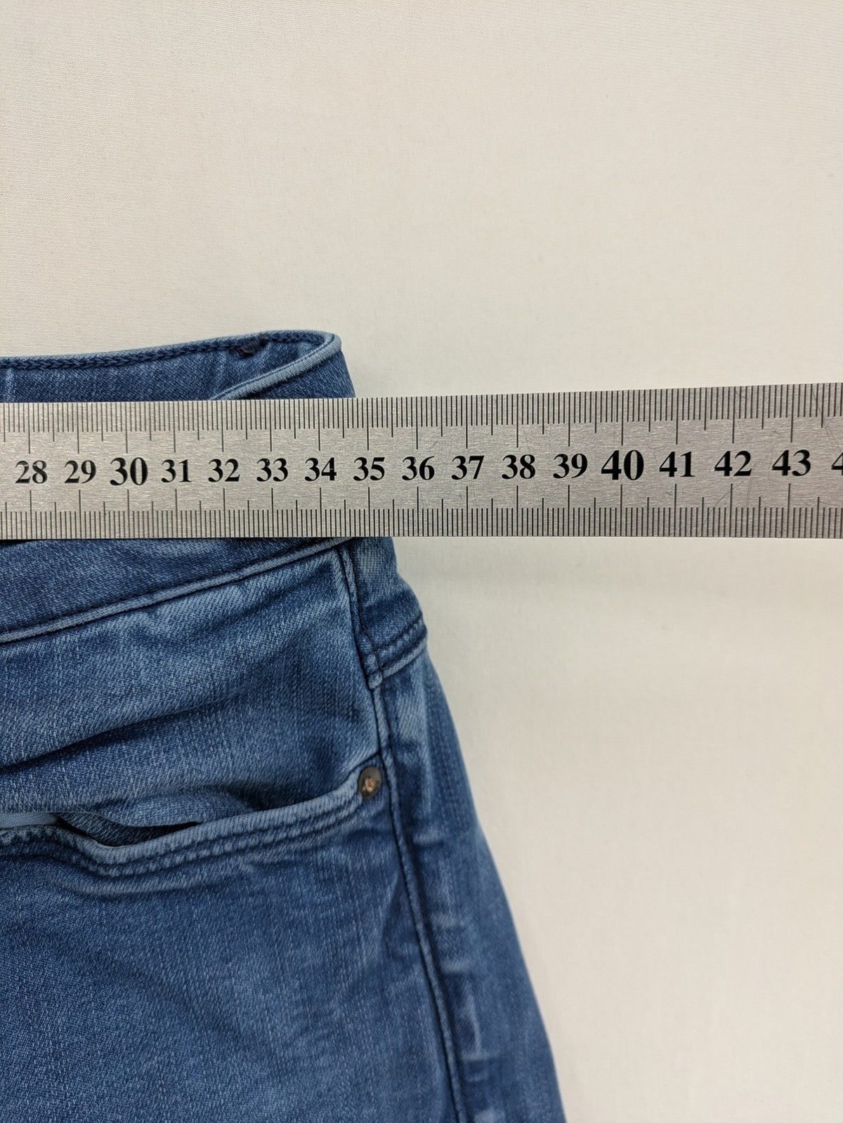 G-Star Raw blue high super skinny jeans with medium wash and logo details.