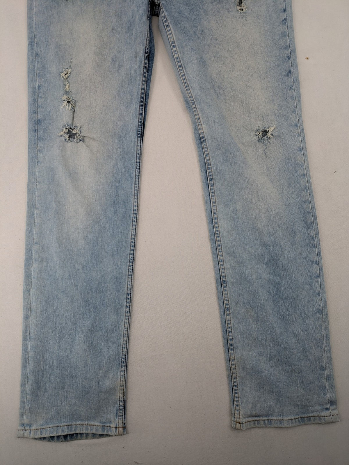Koton Jeans blue straight jeans with distressed details and classic 5-pocket style.
