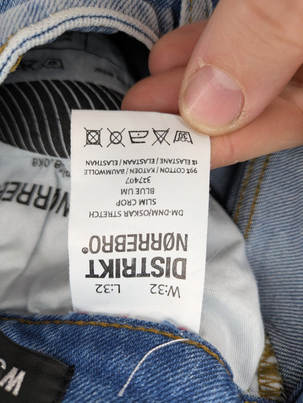 Oskar blue slim fit jeans with classic 5-pocket design and light wash.