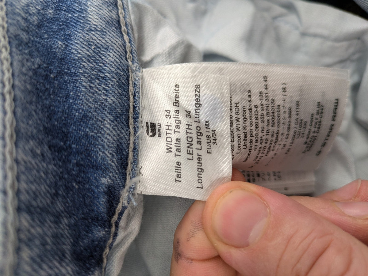 G-Star Raw blue slim fit jeans with 5-pocket design and light wash denim.