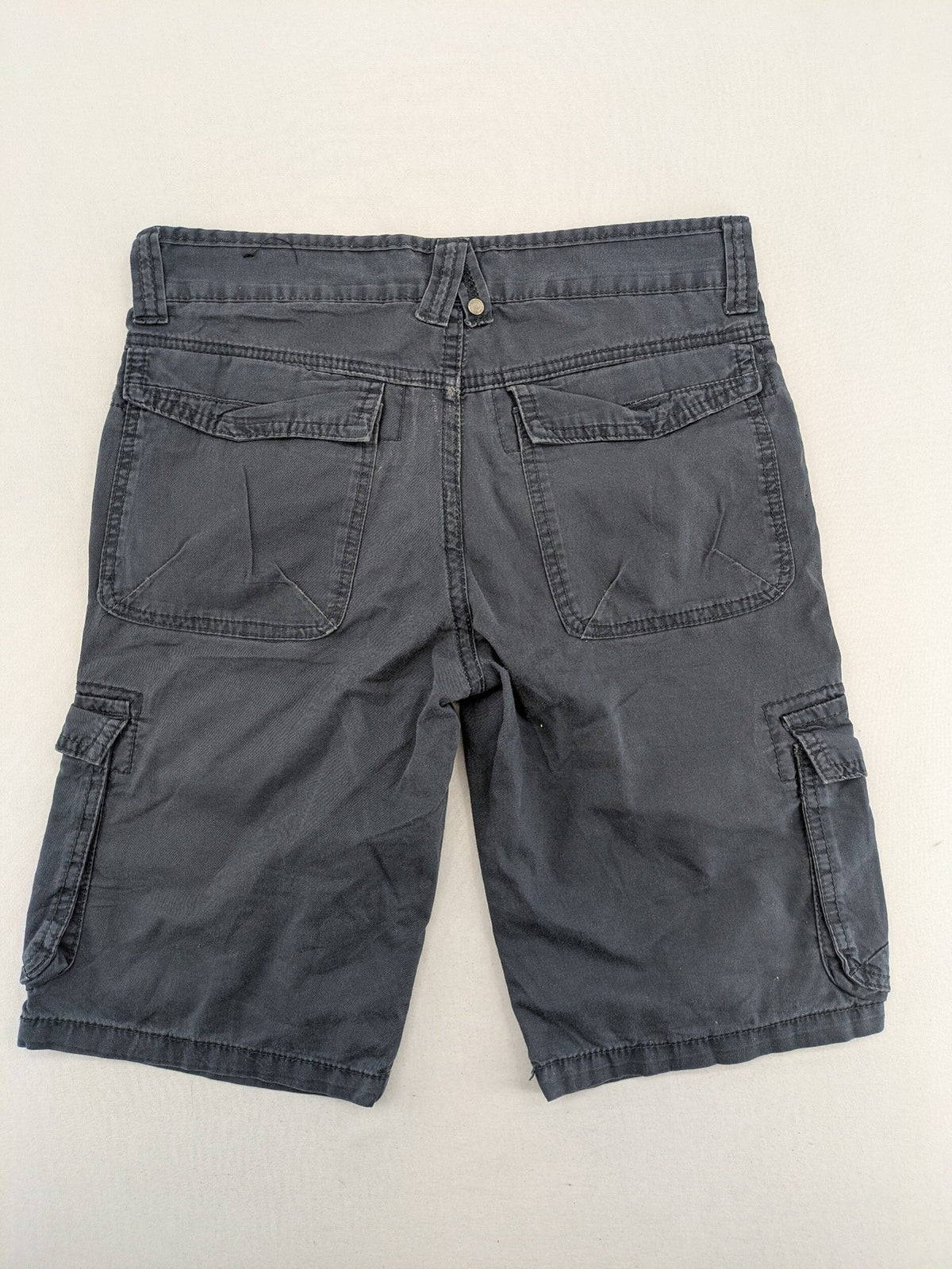 Crosswind grey cargo shorts with multiple pockets and durable cotton material.