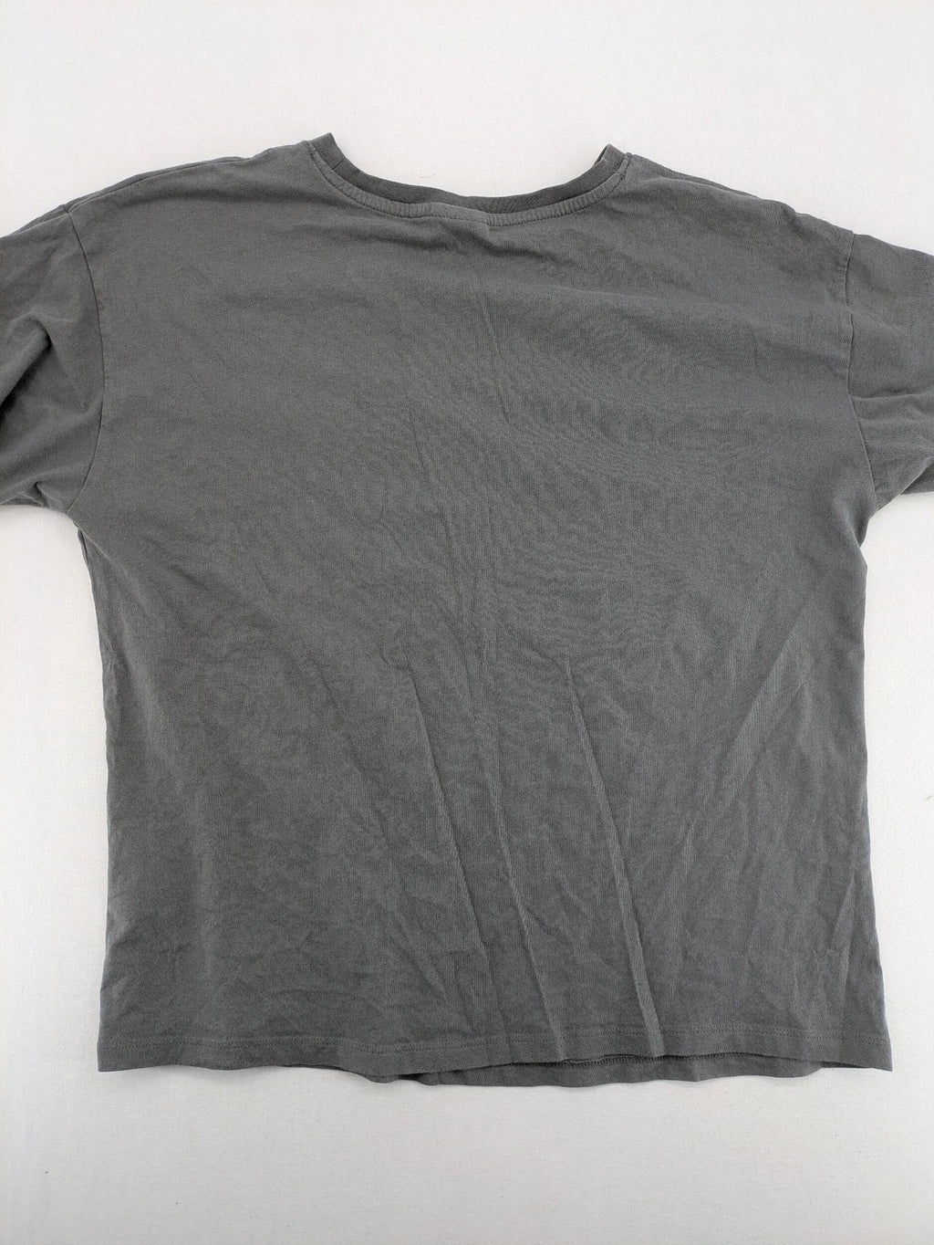 Nirvana grey t-shirt with rainbow Smiley logo and "Come As You Are" text.