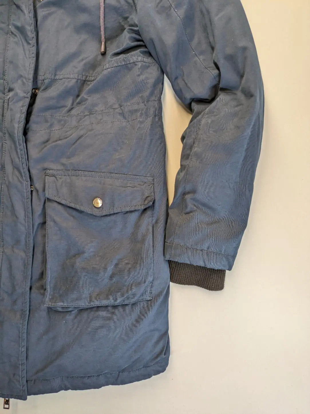 Tommy Hilfiger Denim blue parka coat with faux fur hood and Sherpa lining.