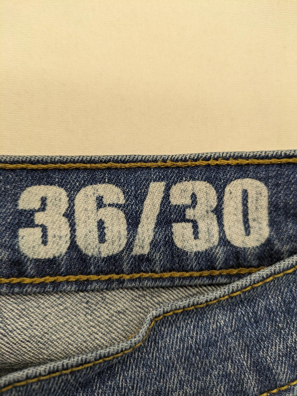 Hero By John Meddox blue straight jeans with five-pocket design and zip fly.