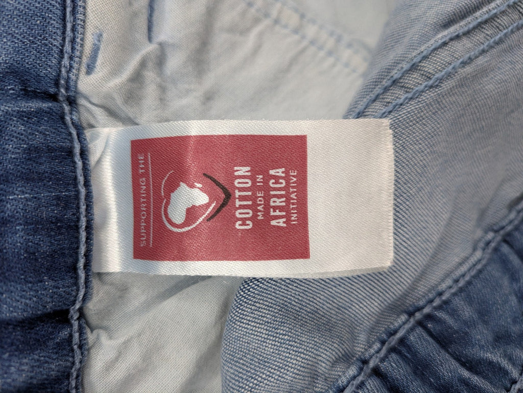Bodyflirt blue high waist paperbag jeans shorts with button fly and rolled cuffs.