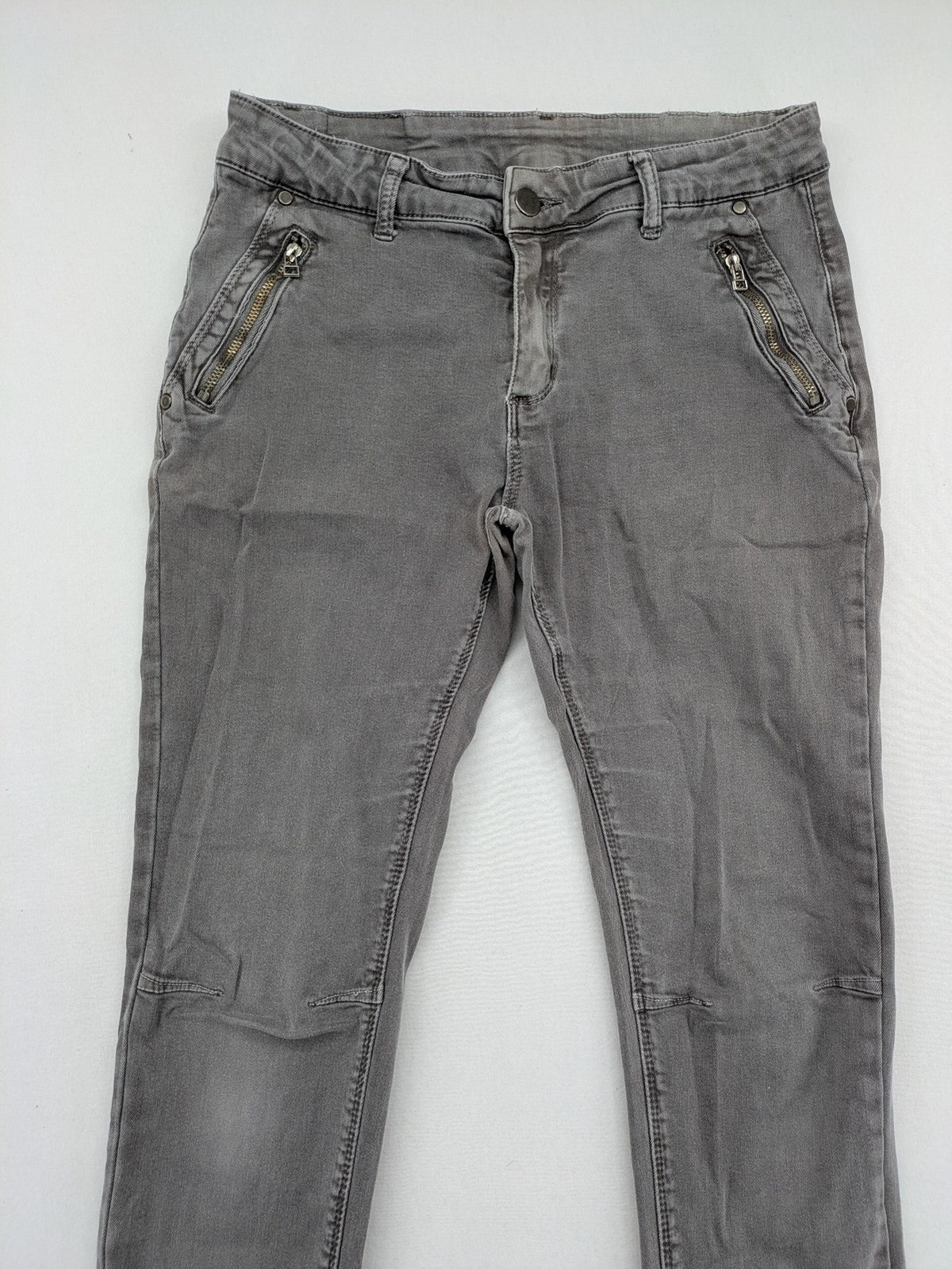 Made in Italy grey biker jeans with zip pockets and structured knee detailing.