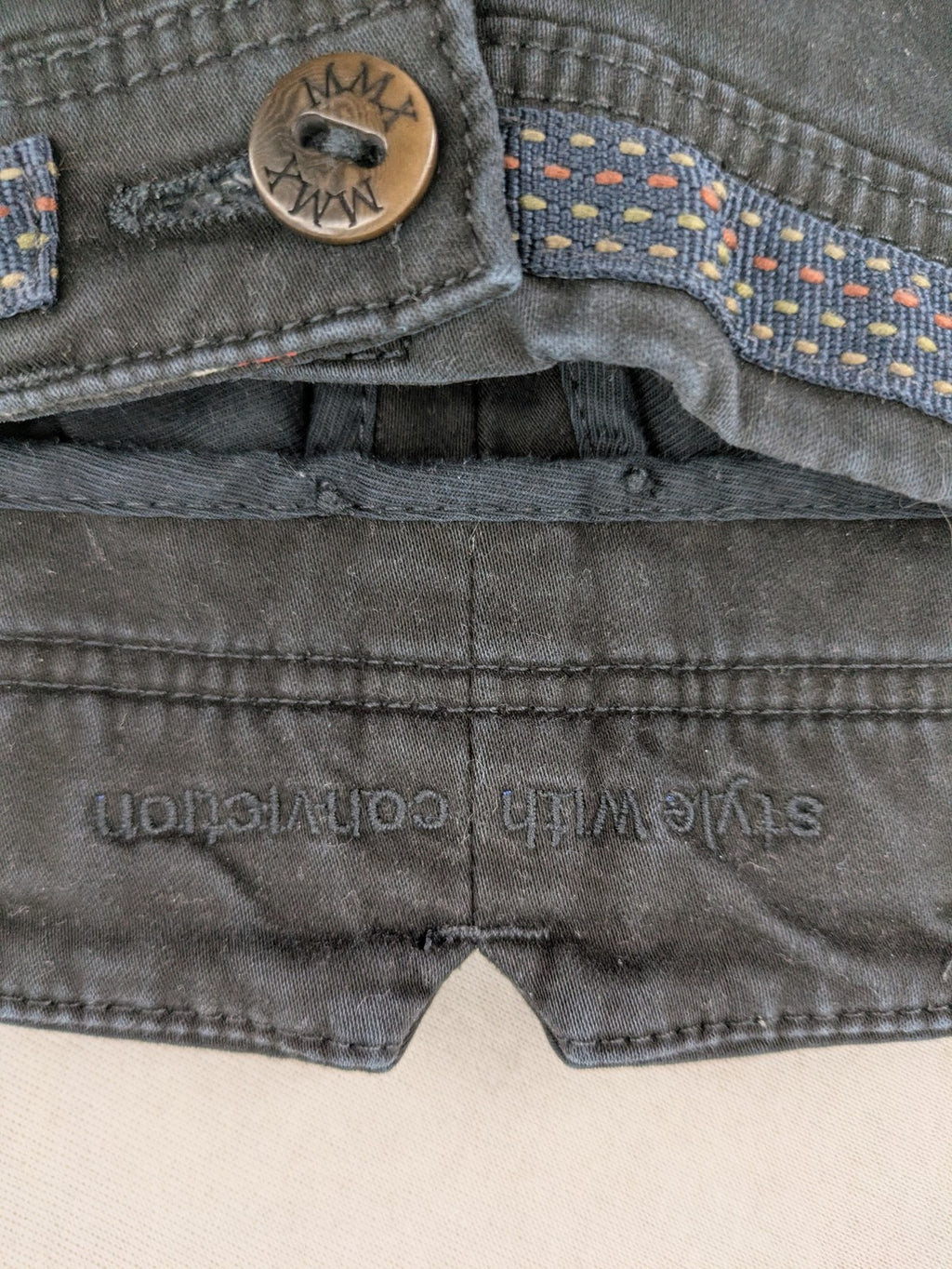 MMX grey chino pants with colorful inner waistband and premium bio-cotton blend.