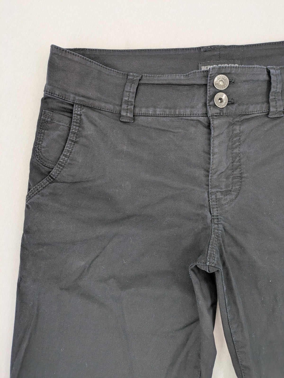 Bernd Berger grey chino pants with double button closure and straight leg design.
