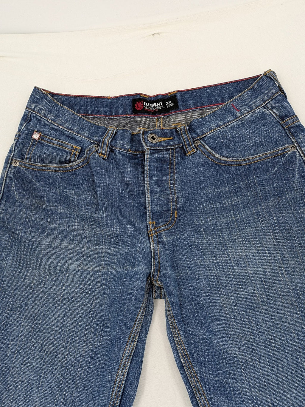 Element blue straight jeans with classic button fly and 5-pocket design.