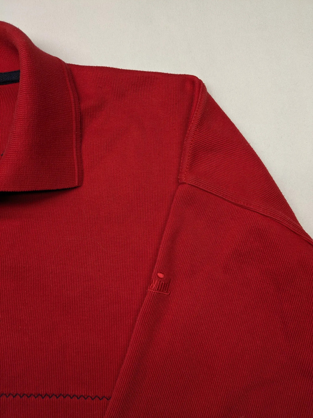 Wind Sportswear red turtle neck jumper with classic polo collar and zigzag stitching.