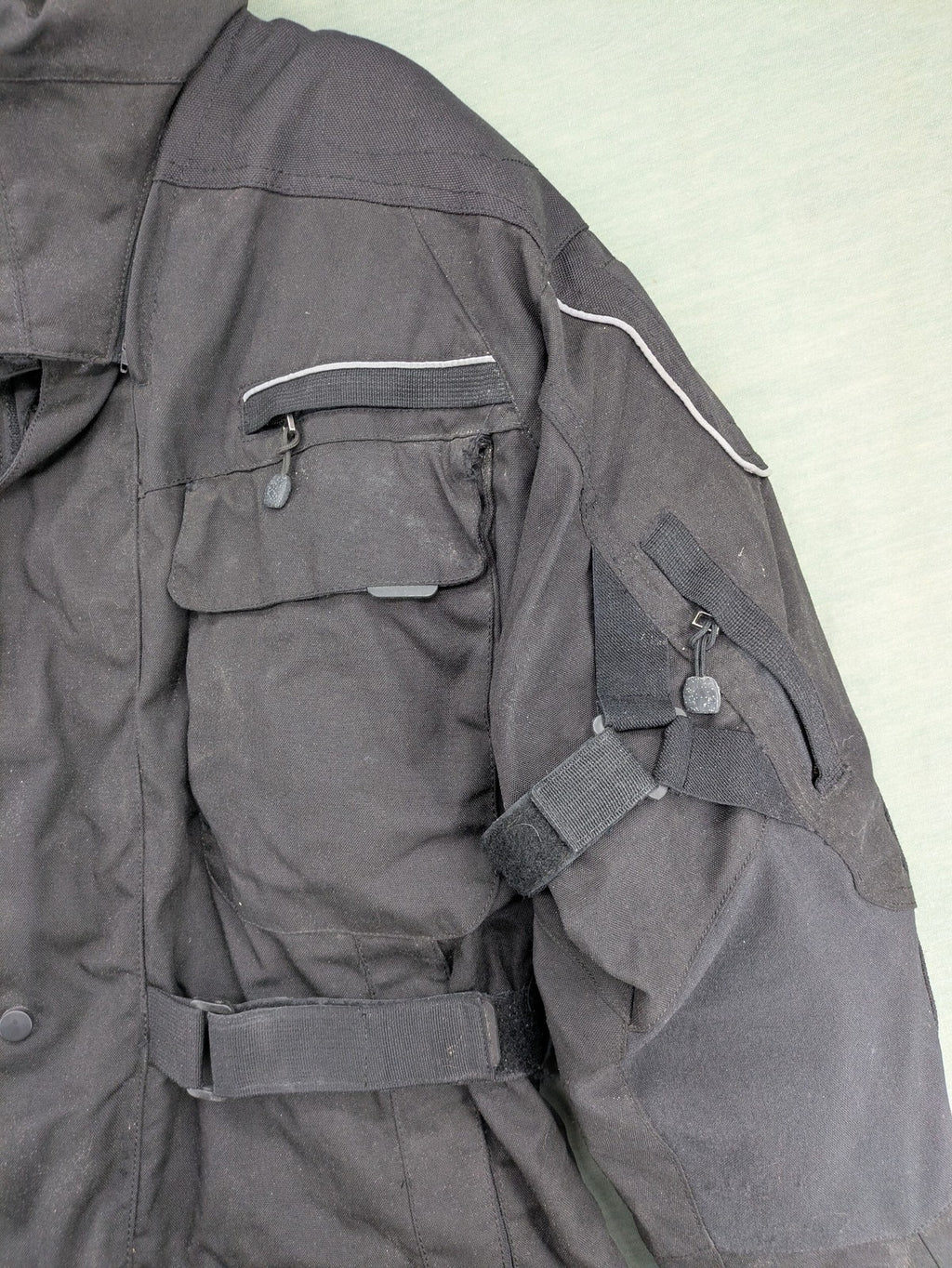 Advanced Experience black motorcycle jacket with Z-Liner membrane and CE protectors, durable Cordura material.