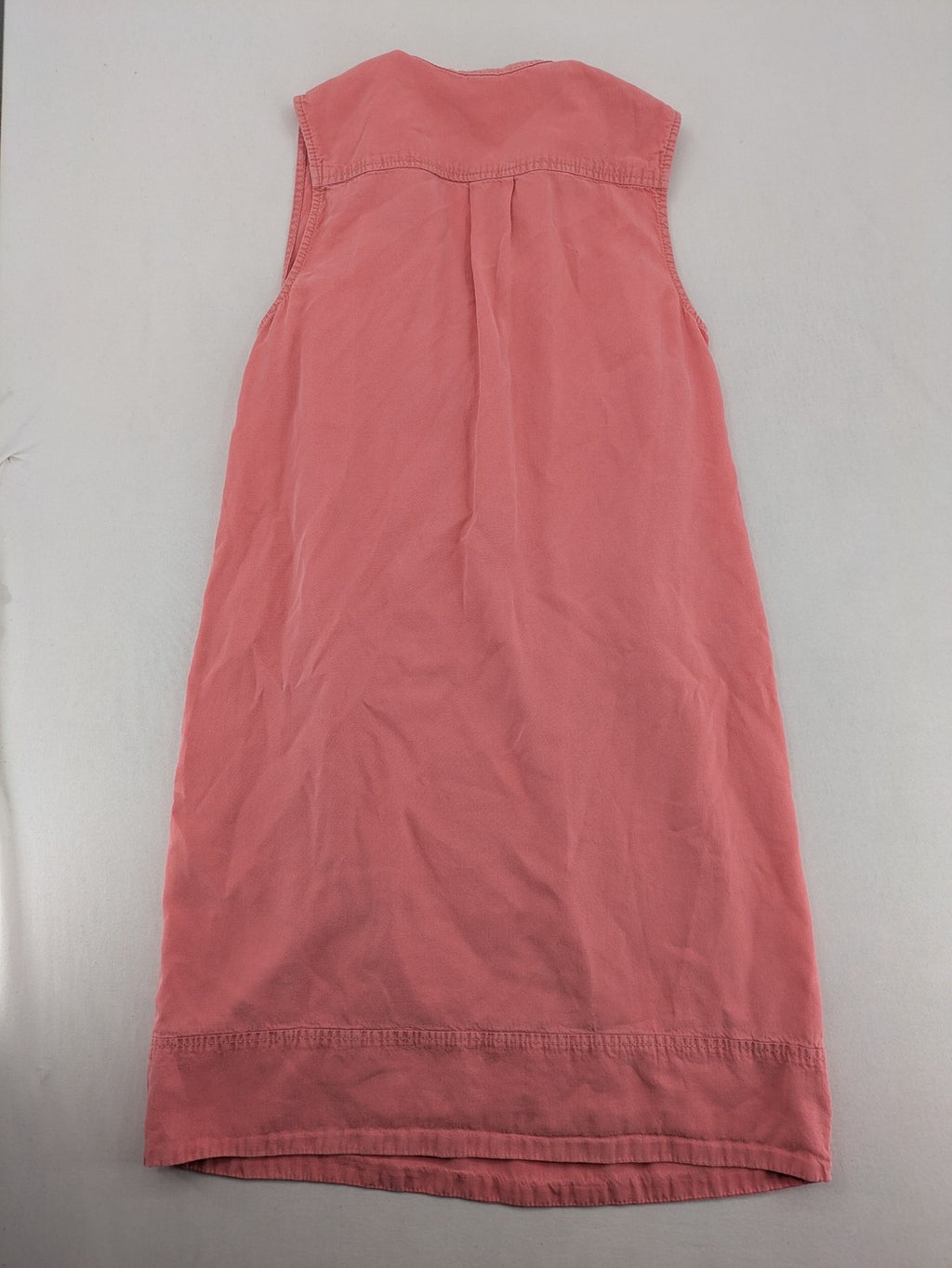 s.Oliver green bridal party dress sleeveless with V-neck and decorative button placket.