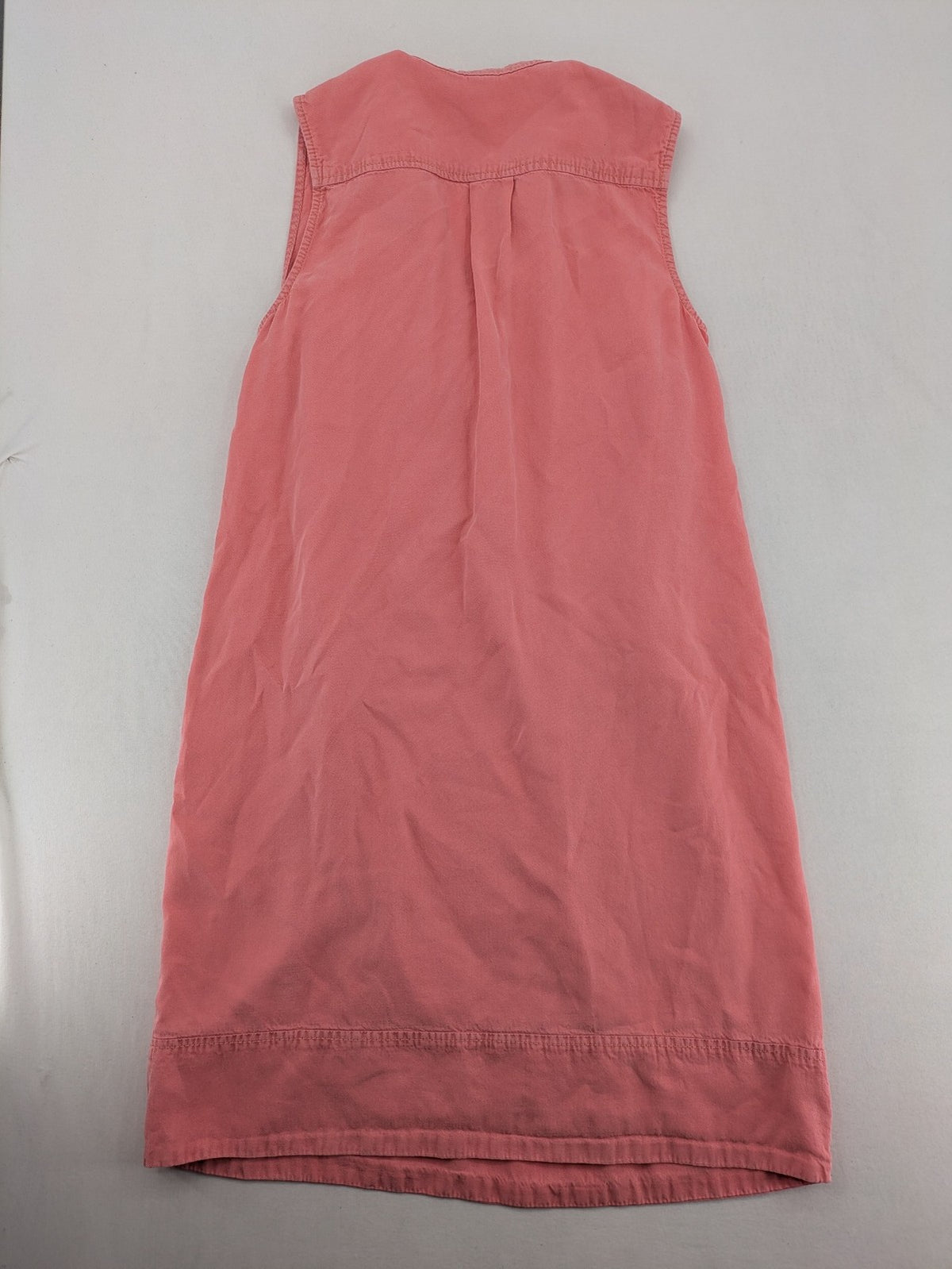 s.Oliver green bridal party dress sleeveless with V-neck and decorative button placket.