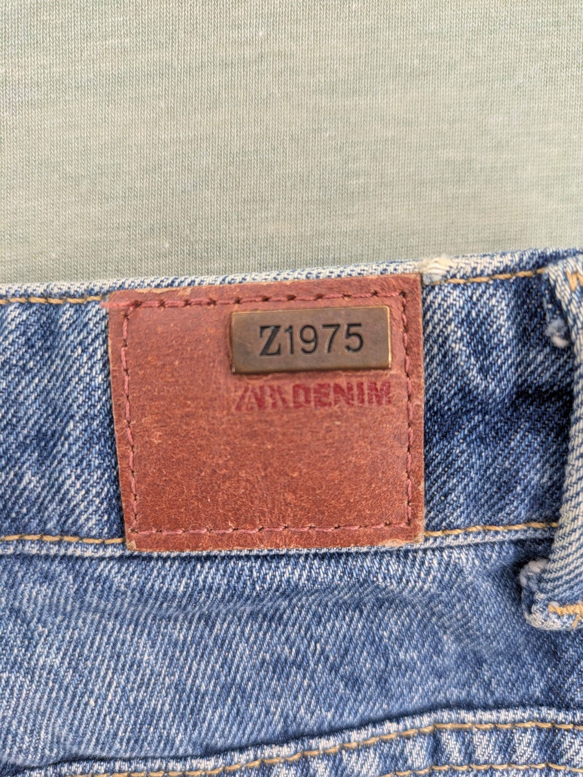 Zara blue wide leg jeans high rise with distressed details and 5-pocket design.