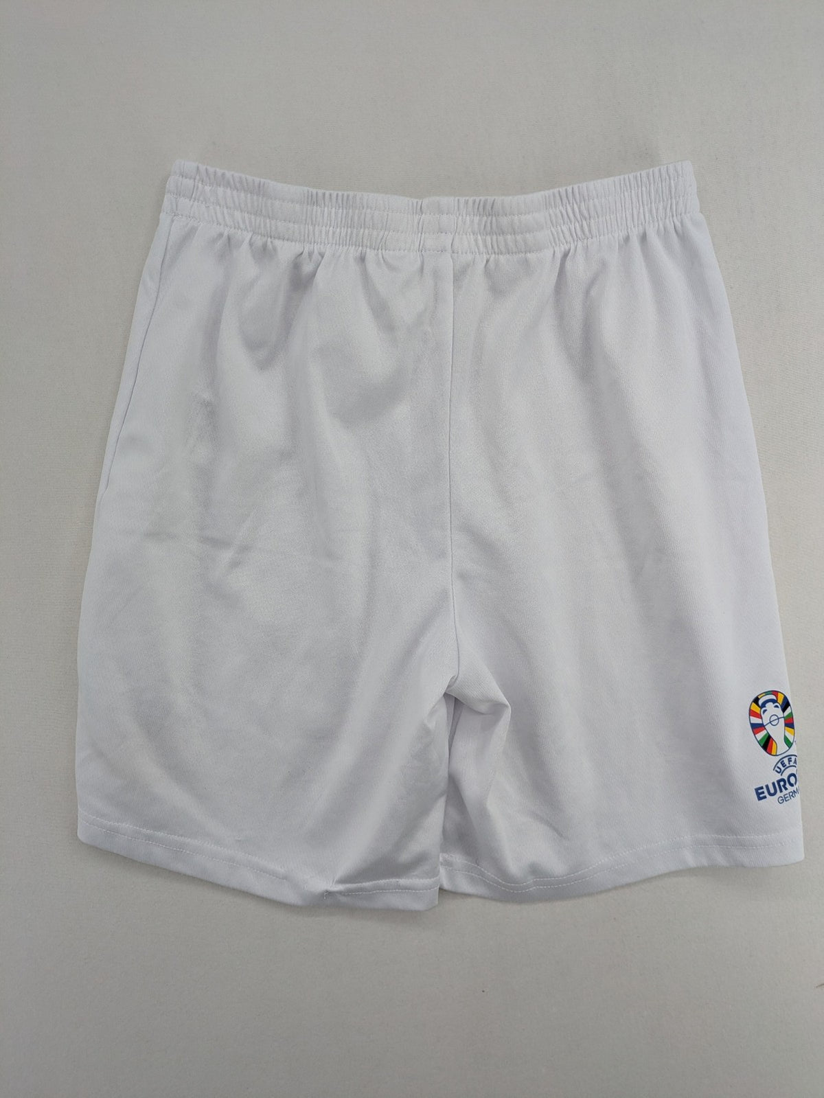 UEFA EURO 2024 white shorts with Germany crest and logo, elastic waistband, breathable material.
