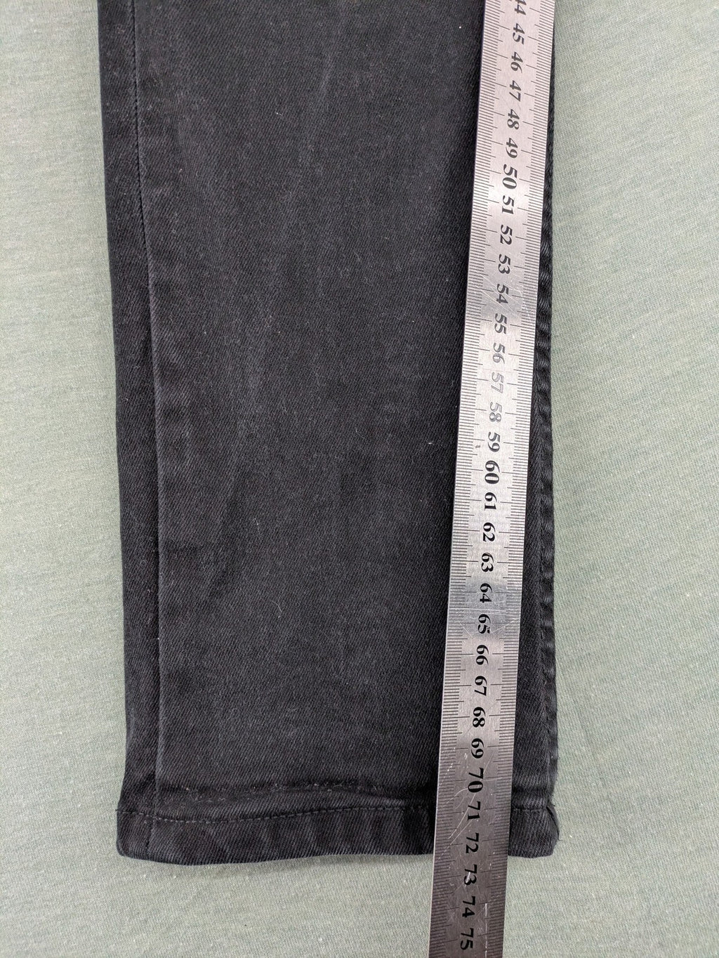 Denim & Co. grey slim fit jeans with button fly and classic 5-pocket design.