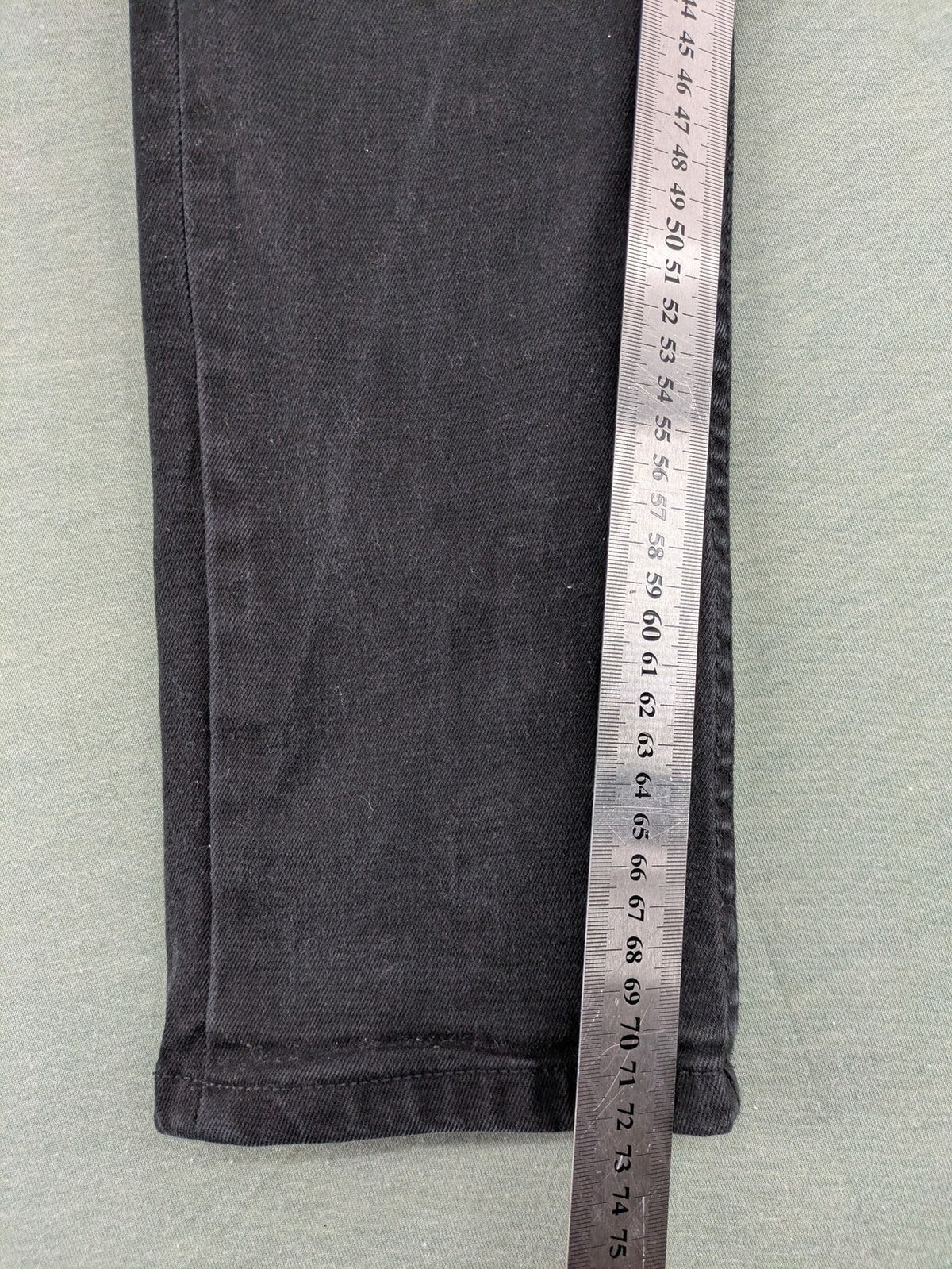 Denim & Co. grey slim fit jeans with button fly and classic 5-pocket design.