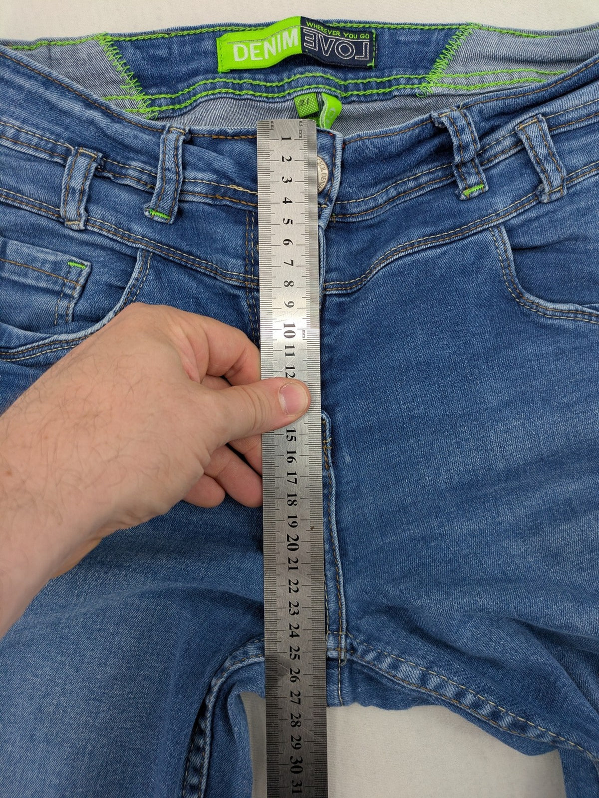 Cecil blue straight jeans with neon green accents and classic 5-pocket design.