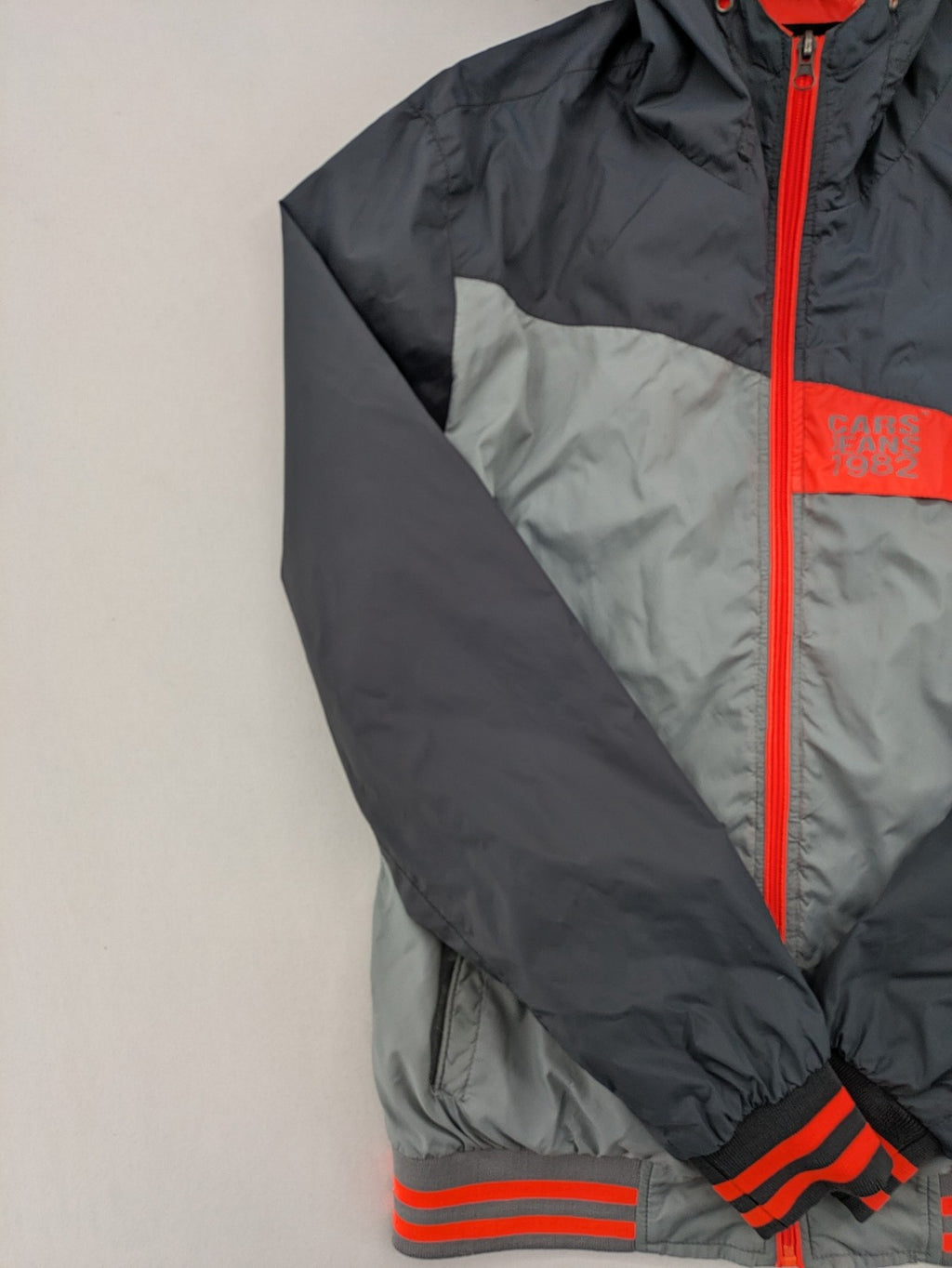 Cars Jeans windbreaker jacket grey orange color block design with logo on chest.