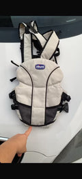 Chicco beige and black baby carrier adjustable straps with padded support for comfort.