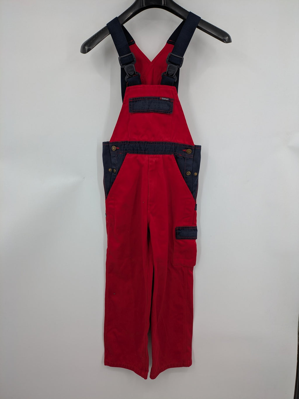 Grene navy red overall with adjustable straps, multiple pockets, and durable material.