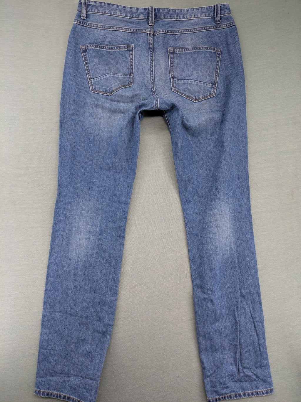 Benetton Jeans blue straight leg denim with button fly and classic design.